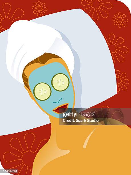 a woman receiving a facial - gurkenmaske stock-grafiken, -clipart, -cartoons und -symbole