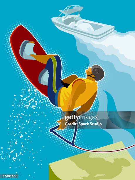 a wakeboarder doing a 360 - wakeboarden stock-grafiken, -clipart, -cartoons und -symbole