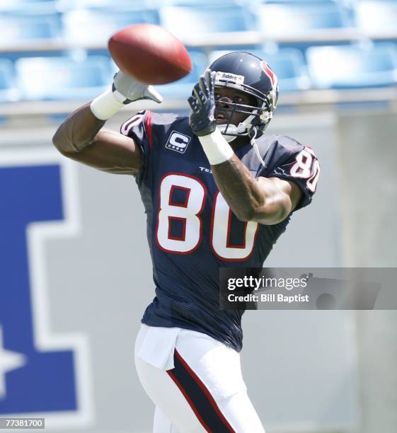 Wide receiver Andre Johnson of the Houston Texans catches a pass during a game against the Carolina Panthers at Bank of America Stadium on September...