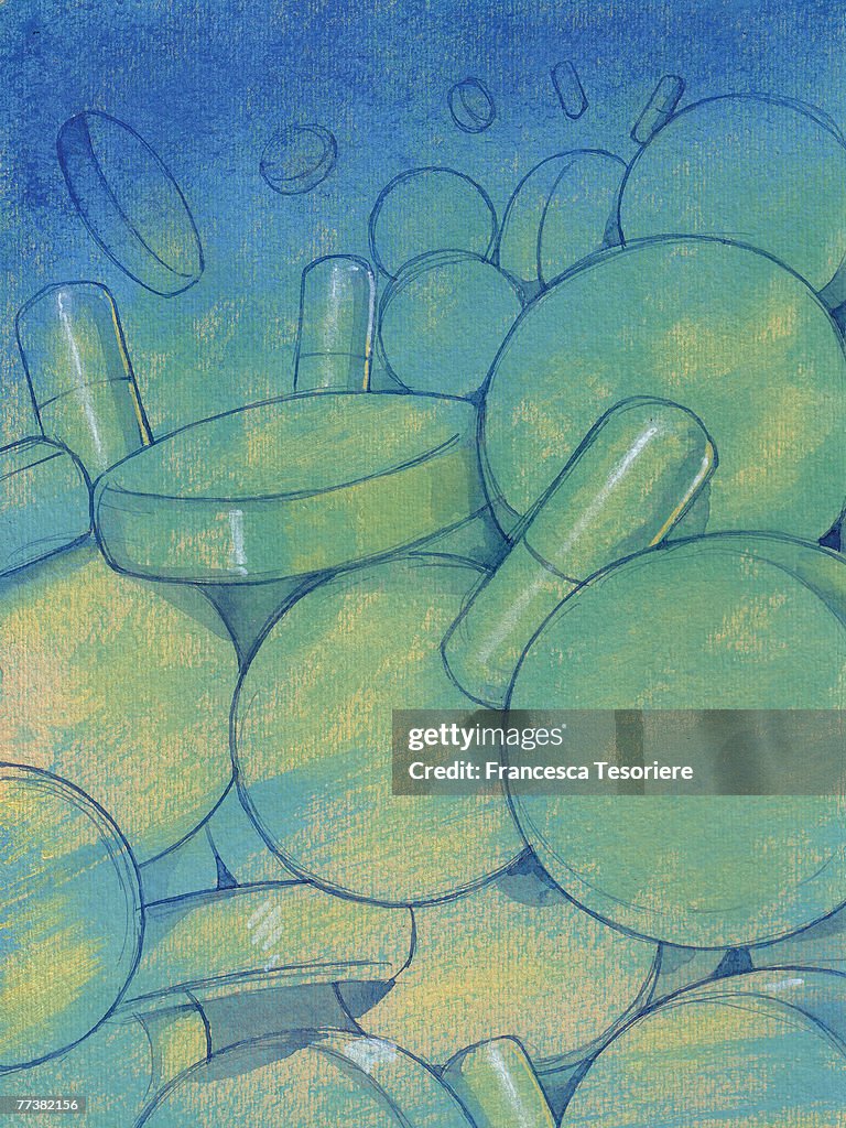 Pile of pills, blue green background