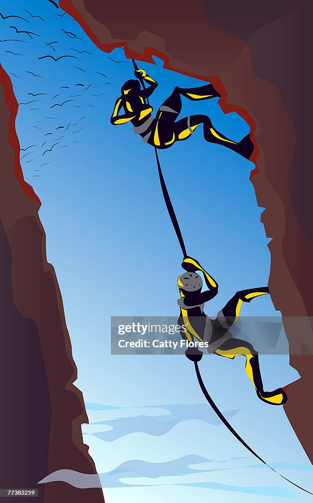 A picture of two men mountain climbing