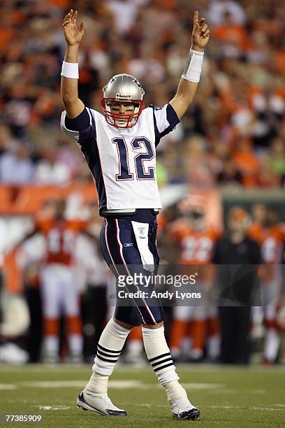 Quarterback Tom Brady of the New England Patriots celebrates the touchdown against the Cincinnati Bengals during the NFL game on October 1, 2007 at...