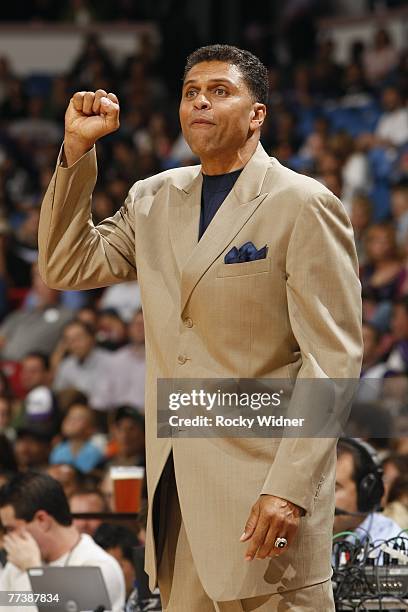Head coach Reggie Theus of the Sacramento Kings calls a play from the sideline during a preseason game against the Phoenix Suns at Arco Arena October...