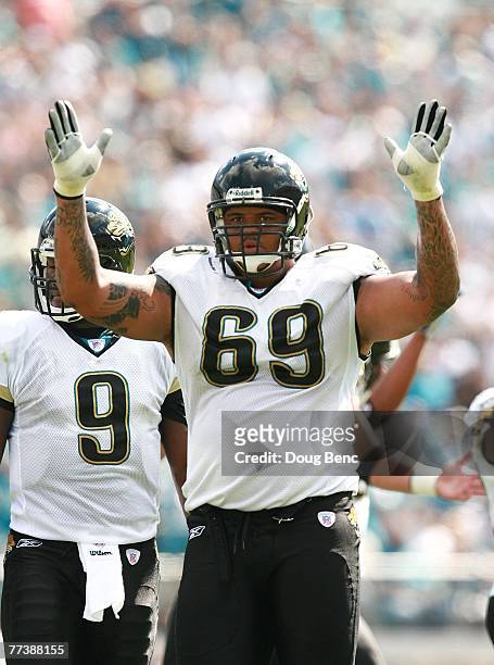 Offensie lineman Khalif Barnes of the Jacksonville Jaguars celebrates after a touchdown while taking on the Houston Texans at Jacksonville Municipal...