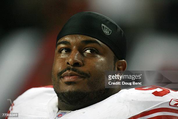Defensive tackle Barry Cofield of the New York Giants sits on the bench late in the game against the Atlanta Falcons at Georgia Dome on October 15,...