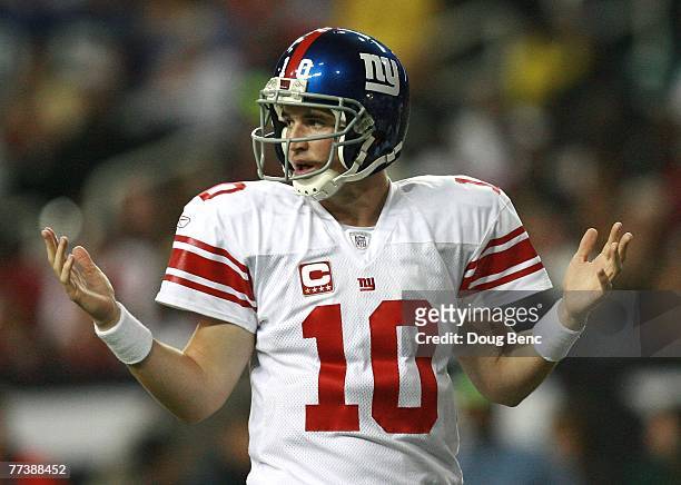 Quarterback Eli Manning of the New York Giants looks to the sidelines for a play while taking on the Atlanta Falcons at Georgia Dome on October 15,...