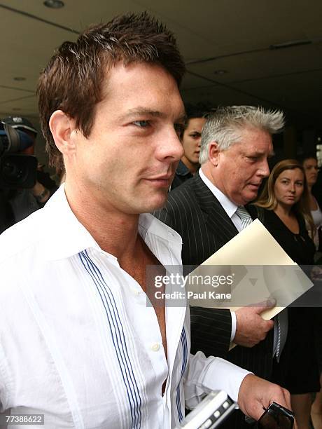 Former West Coast Eagles AFL player Ben Cousins and his lawyer Shane Brennan leave the Perth Magistrates Court after facing drug possession charges...