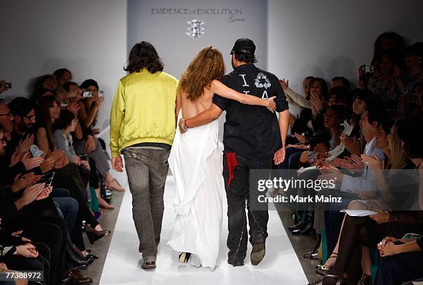 Designers Ali Alborzi and Andrew McCarthy walk the runway with a model at the Evidence Of Evolution Spring 2008 fashion show during Mercedes Benz...