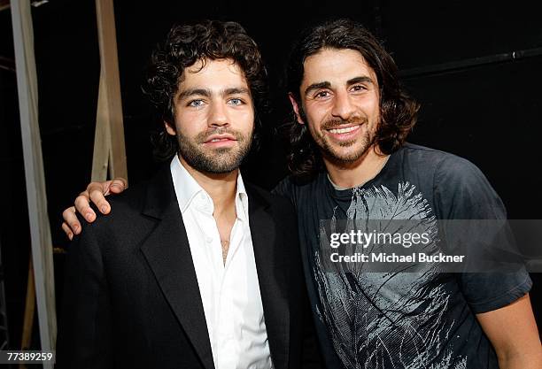 Designer Ali Alborzi and actor Adrian Grenier backstage at the Evidence Of Evolution Spring 2008 fashion show during Mercedes-Benz Fashion Week held...