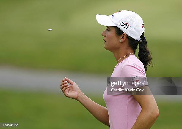 Lorena Ochoa tosses her ball marker in the air on the 11th green during the final round of the 2007 Sybase Classic Presented by ShopRite at Upper...