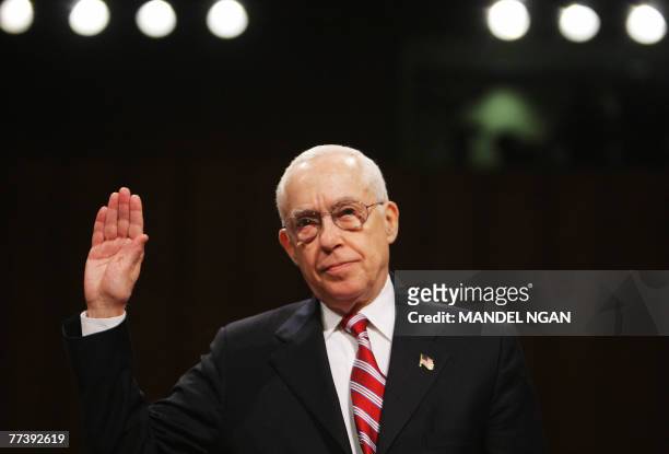 Michael B. Mukasey is sworn-in before testifying before the Senate Judiciary Committee on his nomination to be US attorney general on 17 October 2007...