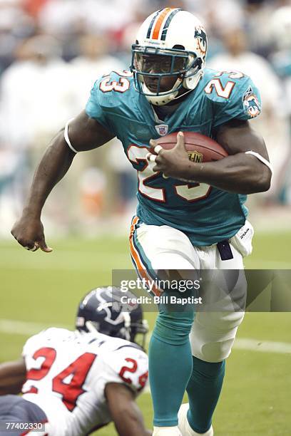 Running back Ronnie Brown of the Miami Dolphins rushes during a game against the Houston Texans at Reliant Stadium on October 7, 2007 in Houston,...