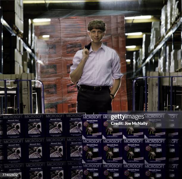 Microsoft owner and founder Bill Gates poses in front of hundreds of boxed Microsoft products in 1986 at the packaging facility in the new 40-acre...