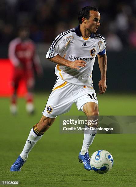 Landon Donovan of the Los Angeles Galaxy controls the ball on the attack against Toronto FC during their MLS match at the Home Depot Center on...