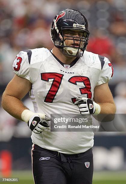 Eric Winston of the Houston Texans jogs on the field during the game against the Miami Dolphins at Reliant Stadium on October 7, 2007 in Houston,...