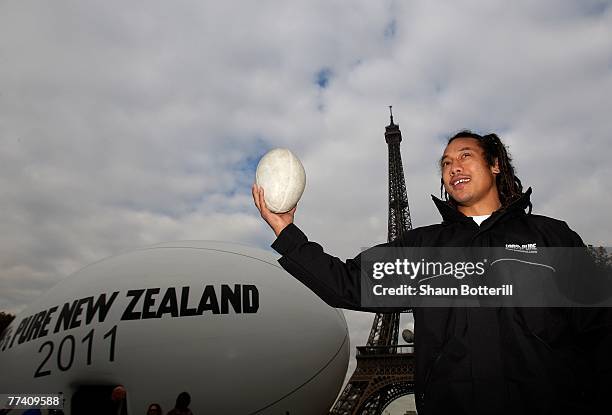 Former All Black Captain Tana Umaga poses in front of 100% Pure New Zealand Rugby Ball Venue during a New Zealand 2011 Rugby World Cup Photocall on...