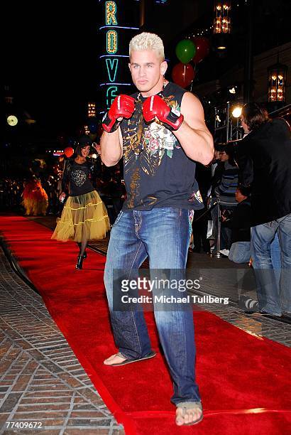 Mixed martial artist Daniel Puder models on the runway during the "Groovywood" fashion show highlighting the Ed Hardy 2008 Spring Collection, held at...