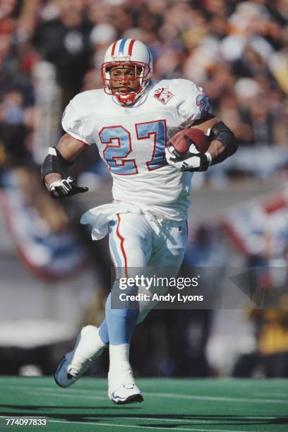 Eddie George, Running Back for the Tennessee Titans runs the ball during the American Football Conference Central game against the Minnesota Vikings...