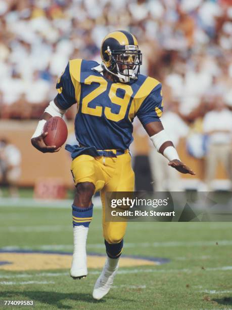 Eric Dickerson, Running back for the Los Angeles Rams runs the ball during the National Football Conference West game against the Detroit Lions on 19...