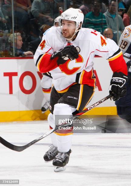 Rhett Warrener of the Calgary Flames skates against the Nashville Predators at the Sommett Center on October 13, 2007 in Nashville, Tennessee....