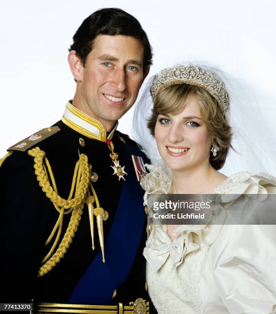 The Prince and Princess of Wales after their wedding at Buckingham Palace on 29th July 1981. .