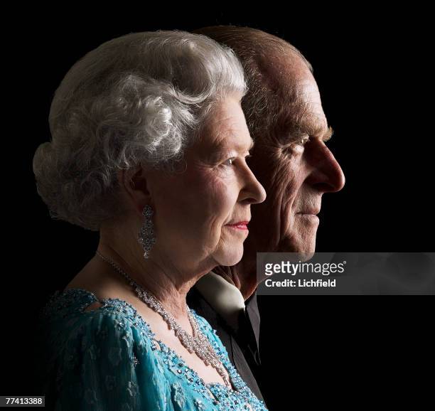 The Queen and HRH The Duke of Edinburgh at Buckingham Palace on 26th November 2001. Part of a series of photographs taken to commemorate the Golden...