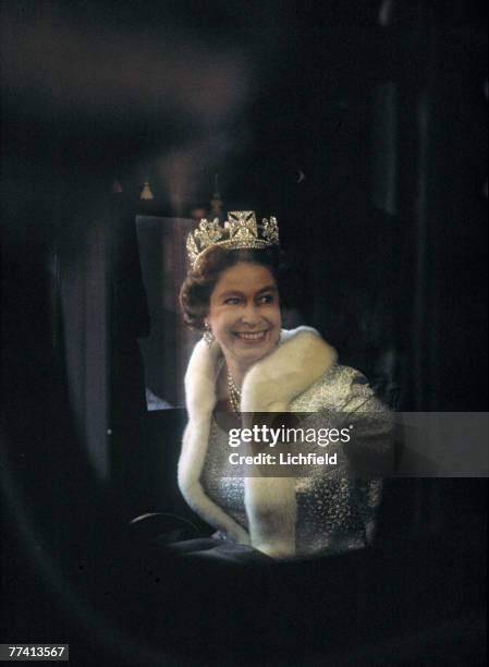 The Queen in her coach on her way to the Houses of Parliament for the State Opening of Parliament on 1st November 1971. .