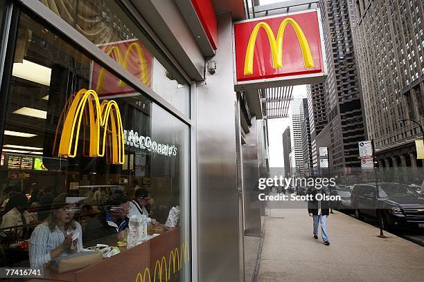 Customers eat at a McDonald's restaurant October 19, 2007 in Chicago, Illinois. McDonald's Corp., the world's largest restaurant chain, reported...
