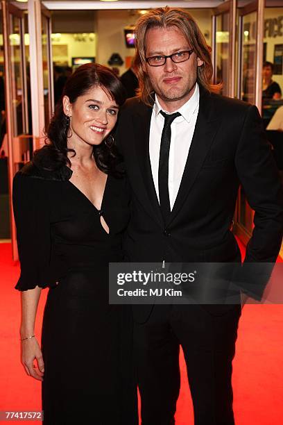 Director Andrew Dominik and wife actress Robin Tunney arrive at the BFI 51st London Film Festival 'The Assassination Of Jessie James' premiere at The...