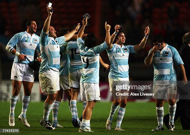 Argentina players celebrate victory after the Bronze Final of the Rugby World Cup 2007 between France and Argentina at the Parc des Princes on...