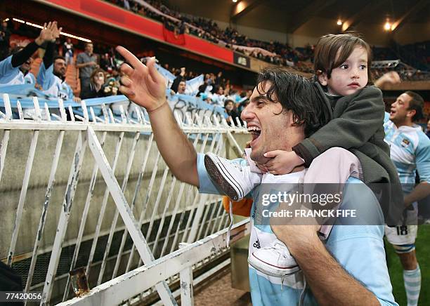 Argentina's scrum-half and captain Agustin Pichot jubilates after winning the rugby union World Cup third place final match France vs. Argentina, 19...