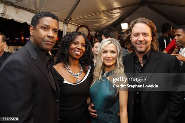 Actor Denzel Washington and his wife Pauletta Pearson pose with actor Russell Crowe and his wife Danielle Spencer at the world premiere of American...