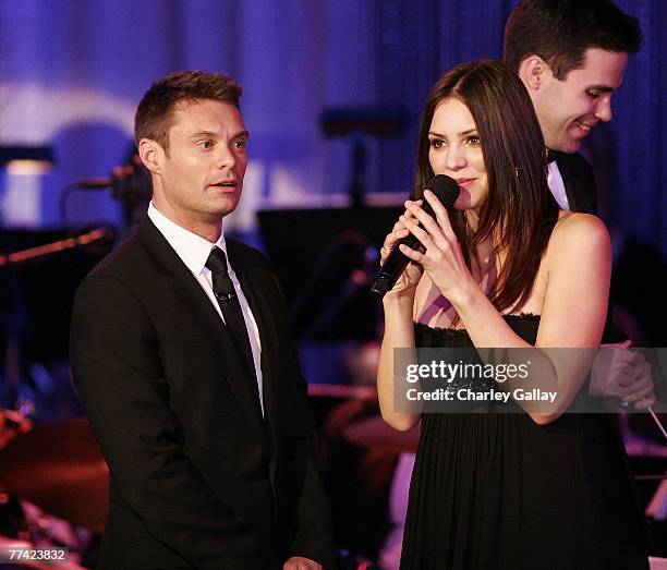 Singer Katharine McPhee and television personality Ryan Seacrest perform at the 53rd Annual Young Musicians Foundation Gala, celebrating Merv...