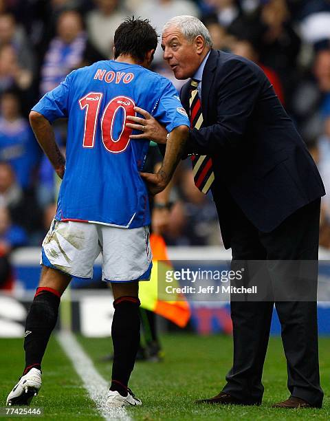 Walter Smith talks with Nacho Novo of Rangers during the Scottish Premier League match between Rangers and Celtic at Ibrox Stadium on October 20 2007...