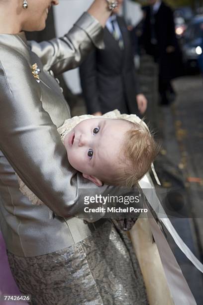 Dutch Princess Ariane leaves the Kloosterkerk carried by her mother Princess Maxima after the christening ceremony of Princess Ariane at The Hague on...