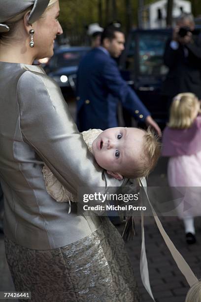 Dutch Princess Ariane leaves the Kloosterkerk carried by her mother Princess Maxima after the christening ceremony of Princess Ariane at The Hague on...