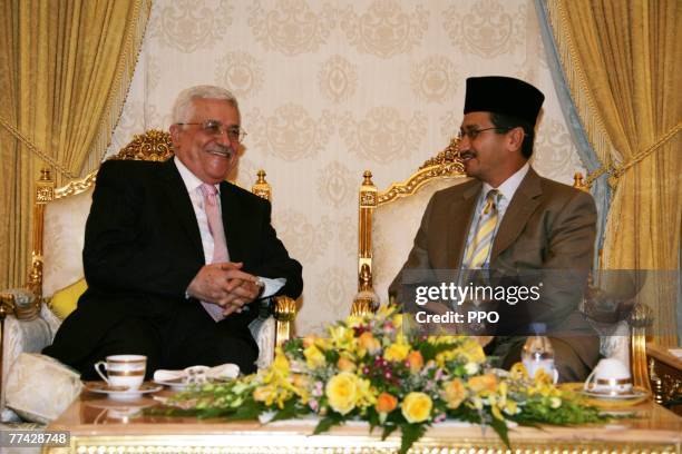 In this handout image supplied by the Palestinian Press Office , Palestinian President Mahmoud Abbas meets with Malaysian King Mizan Zainal Abidin...