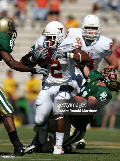 Running back Vondrell McGee of the Texas Longhorns runs against the Baylor Bears at Floyd Casey Stadium on October 20, 2007 in Waco, Texas.