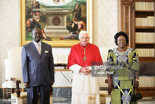 Pope Benedict XVI meets the President of Central Africa Francois Bozizeand his wife at his private library, October 20, 2007 in Vatican City.