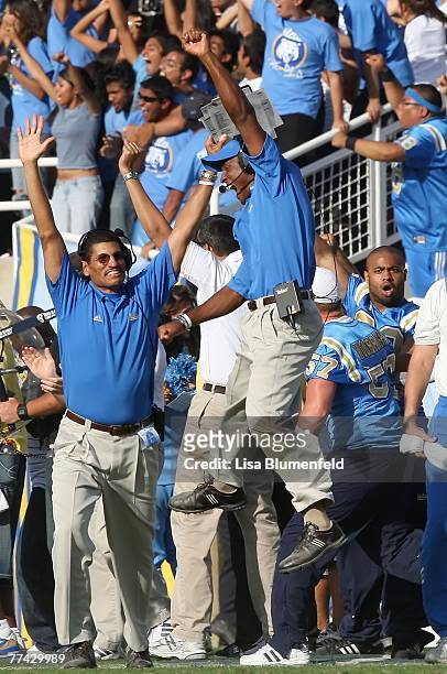 Head coach Karl Dorrell of the UCLA Bruins celebrates a touchdown in the second half against the California Golden Bears at the Pasadena Rose Bowl...