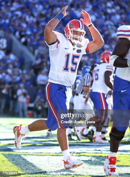 Tim Tebow of the Florida Gators celebrates after throwing a touchdown pass during the SEC game against the Kentucky Wildcats on October 20, 2007 at...