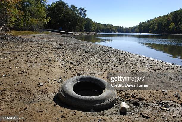 Shoreline and trash that would normally be submerged is exposed at Copperhead Island recreational area on Lake Wylie October 20, 2007 outside of...