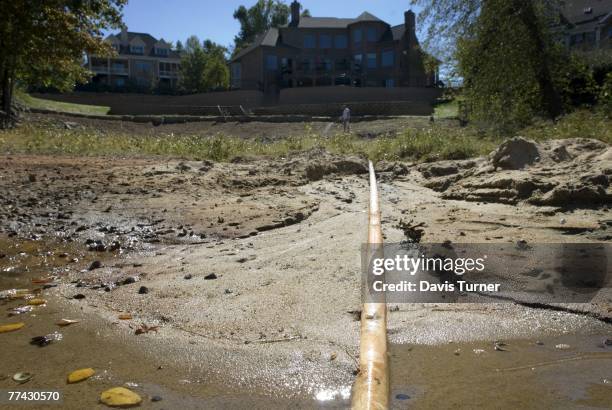 Due to low water levels caused by severe drought, an irrigation line from Lake Wylie is exposed in the Riverpointe neighborhood around the lake...