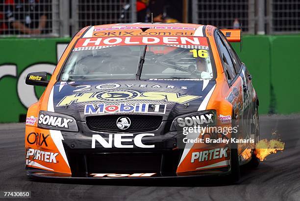 Garth Tander of the Toll HSV Dealer Team leads the race as he races through the VB chicane during race two of round 11 of the V8 Supercar...