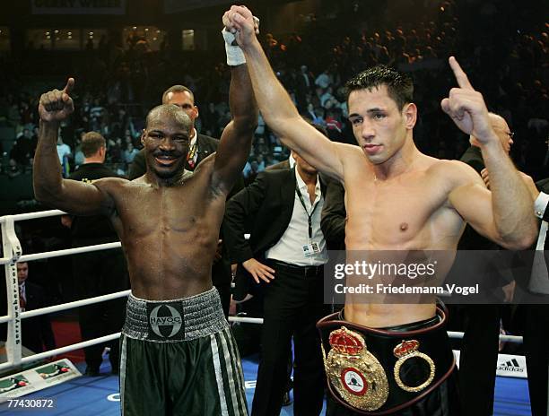 Randy Griffin and Felix Sturm celebrates after the WBA Middleweight World Championship fight between Felix Sturm of Germany and Randy Griffin of the...