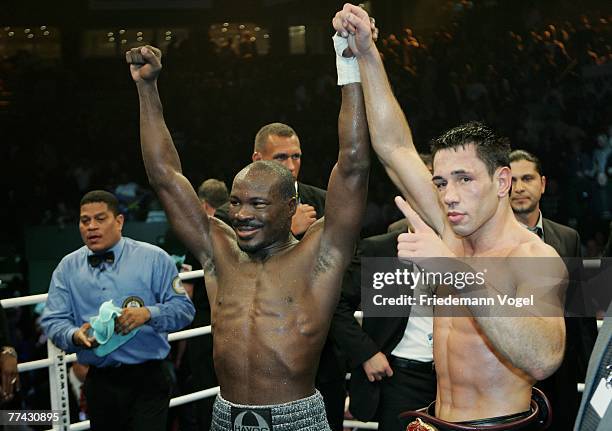 Randy Griffin and Felix Sturm celebrates after the WBA Middleweight World Championship fight between Felix Sturm of Germany and Randy Griffin of the...