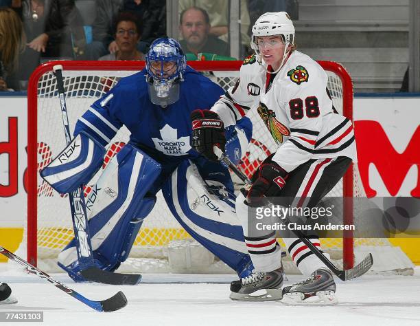 Patrick Kane of the Chicago Black Hawks skates in front of Andrew Raycroft of the Toronto Maple Leafs in a game at the Air Canada Centre October 20,...