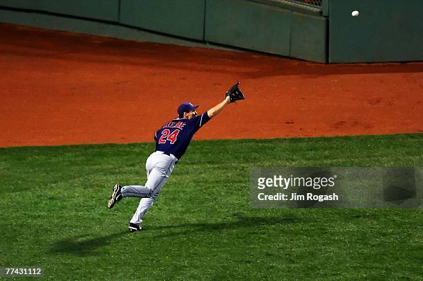 Grady Sizemore of the Cleveland Indians dives touch catch a ball hit by Jacoby Ellsbury of the Boston Red Sox in the fourth inning of Game Six of the...