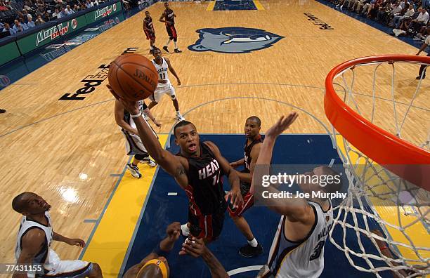 Daequan Cook of the Miami Heat dunks over Darko Milicic of the Memphis Grizzlies at the FedExForum October 20, 2007 in Memphis, Tennessee. NOTE TO...