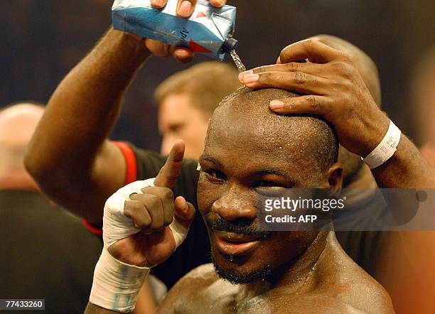 Randy Griffin of the US gestures as he is treated during his WBA middleweight world champion fight against German boxer Felix Sturm 20 October 2007...